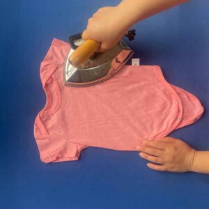 Pressing for baby clothing manufacturing process