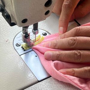 Sewing for baby clothing manufacturing process